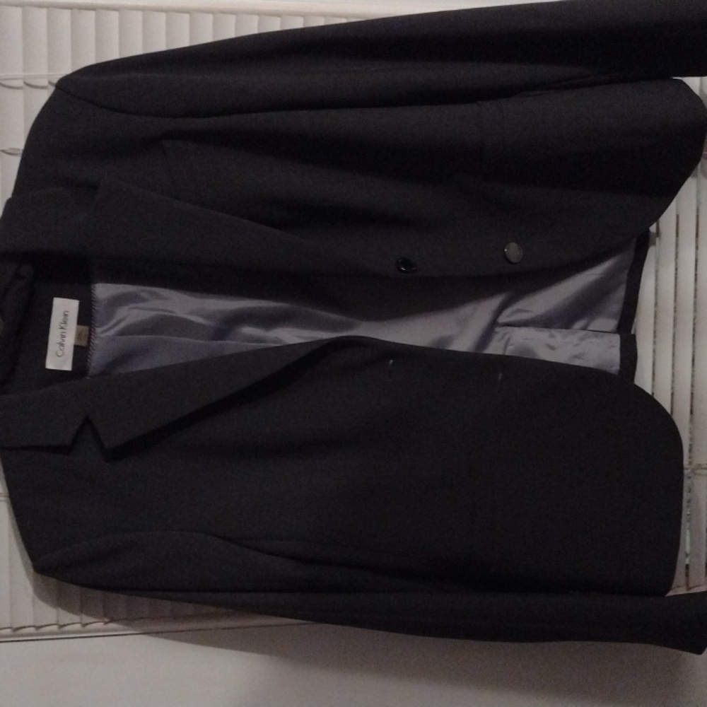 Calvin Klein Ladies Blazer Jacket Size 12 Gray in color.